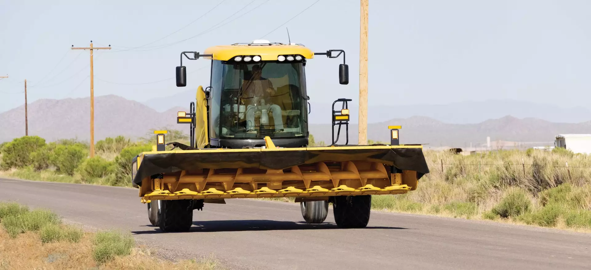 New Holland Speedrower® PLUS Self-Propelled Windrowers